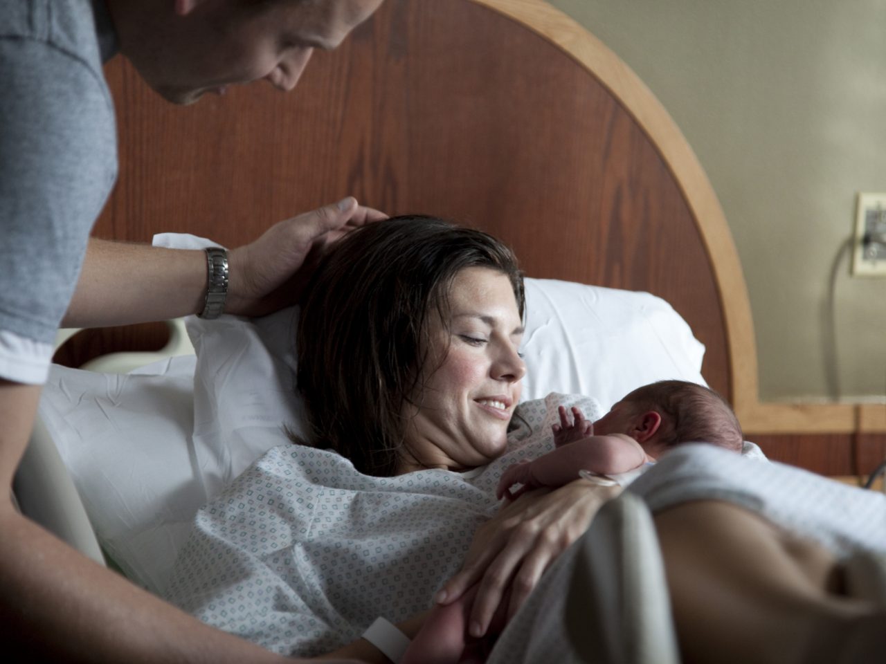 Mother holding baby after just giving birth Breastfeeding Education: Tips & Techniques for Getting Started